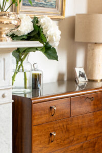 Adler Chest of Drawers shown in Walnut Dark French polish, with Antique Brass handles